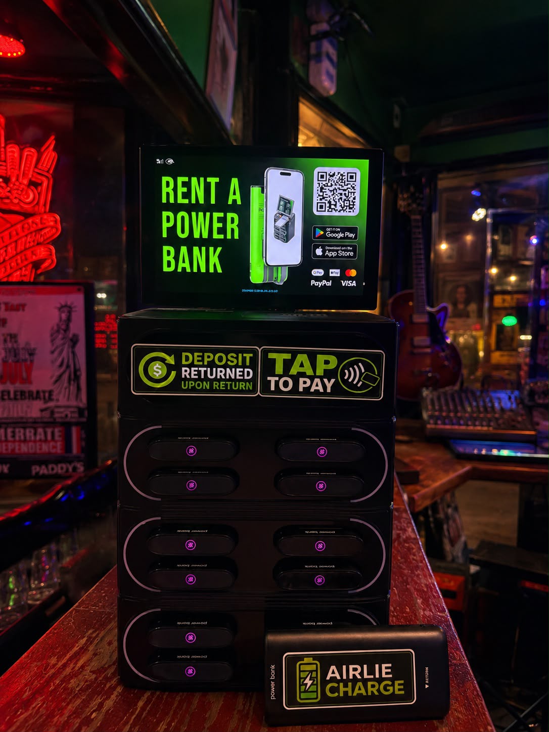 Airlie Charge power bank rental station installed inside Paddy’s Shenanigans in Airlie Beach